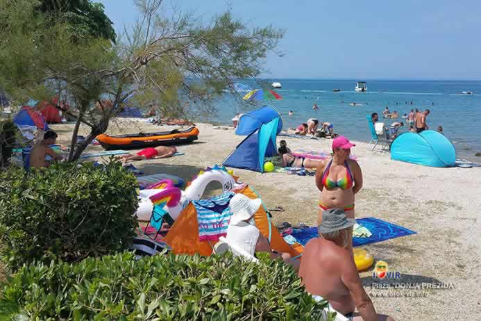 Sunčanje na plaži Donja Prezida